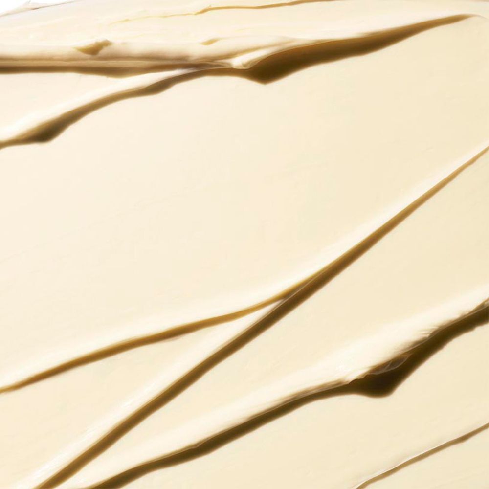 Gros plan sur la texture crémeuse du Clinique Deep Comfort Body Butter.