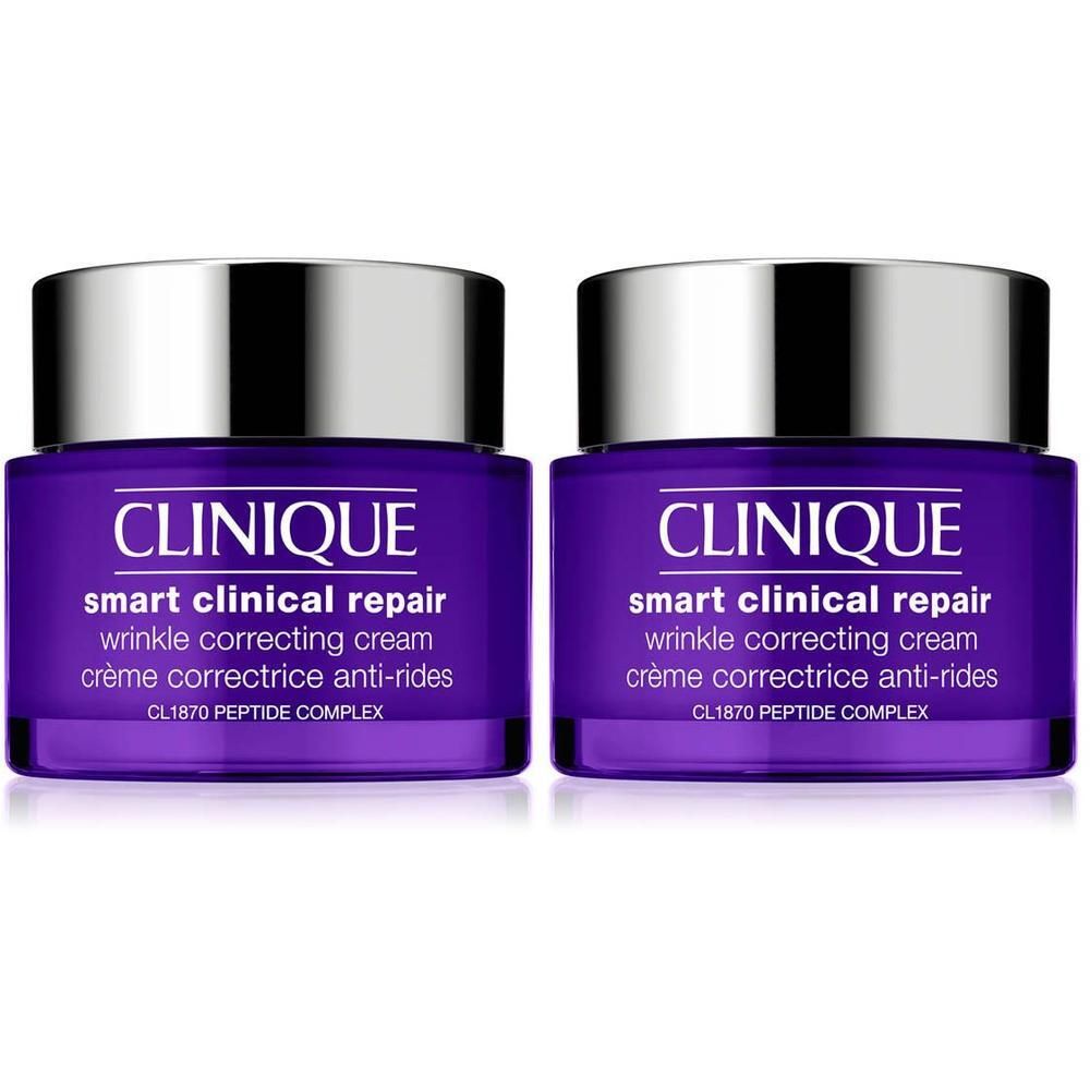 Deux pots violets avec couvercles argentés. Inscription: Clinique Smart Clinical Repair, crème correctrice anti-rides.