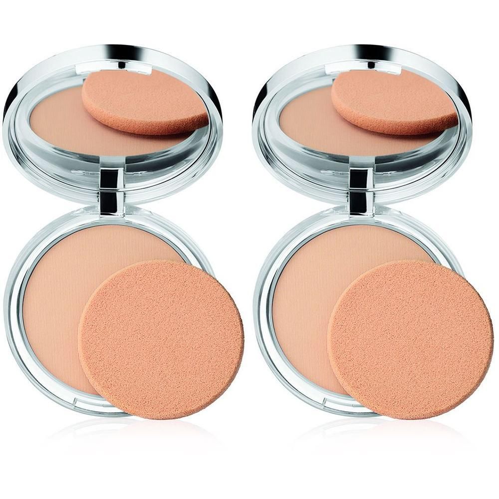 Twee ronde make-up poederdozen met spiegel en spons. Open, met licht poeder en perzikkleurige spons.