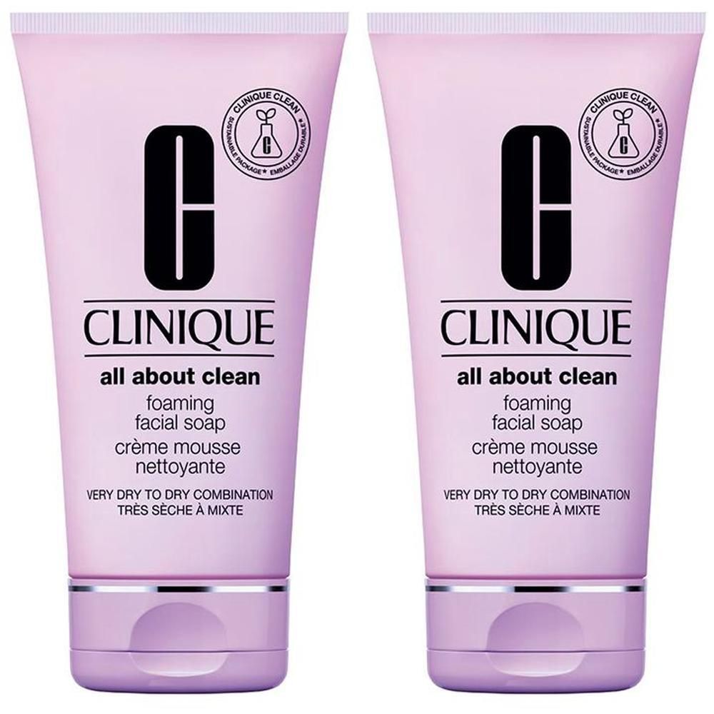 Deux tubes de Clinique All About Clean Crème Mousse Nettoyante. Tubes roses avec logo noir et nom du produit. Texte: Peaux très sèches à mixtes.