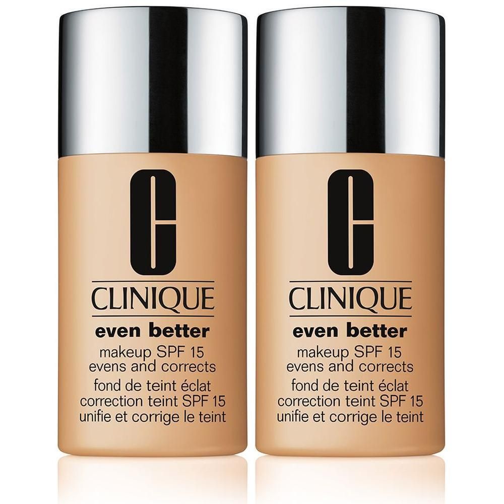 Deux flacons de Clinique Even Better Make-Up SPF15. Bouteilles beiges avec bouchons argentés. Texte: Even Better, SPF 15.