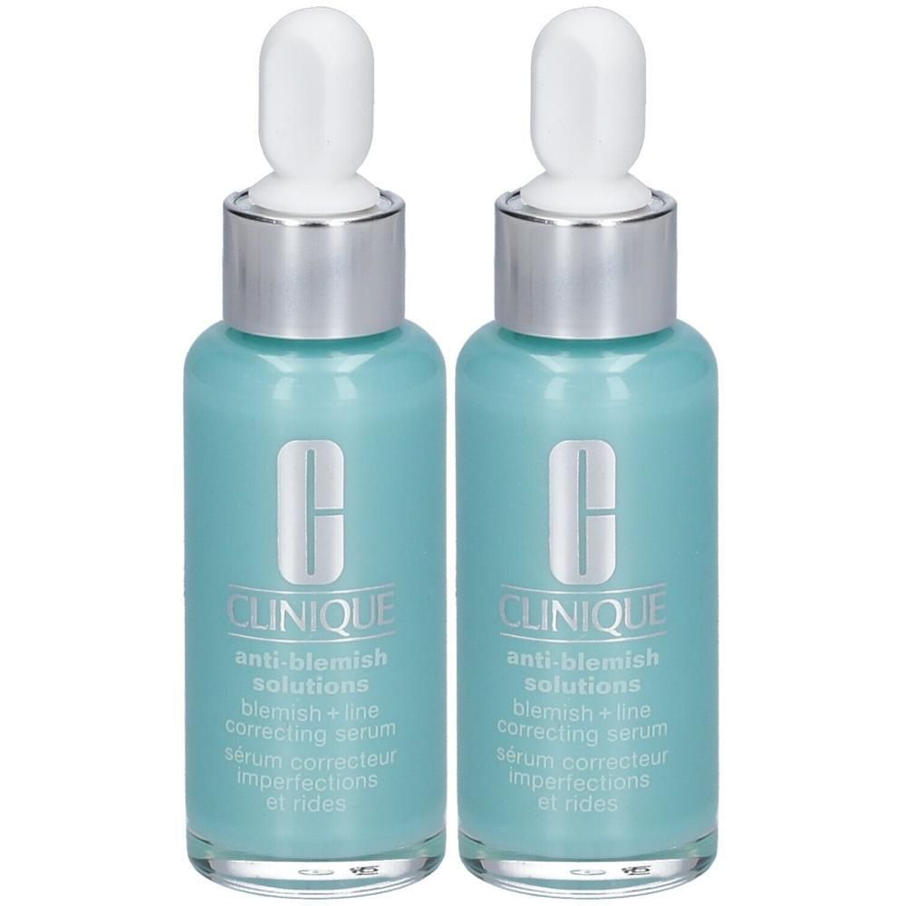Twee flacons Clinique Anti-Blemish Solutions serum. Turquoise glazen flacons met witte dop en pipet. Tekst: Anti-Blemish Solutions, serum correcteur imperfections.