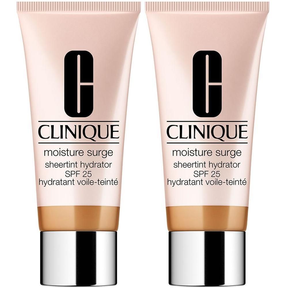 Deux tubes de Clinique Moisture Surge Hydratant Voile-Teinté SPF25. Tubes rose-beige avec bouchons argentés. Logo noir et nom du produit.