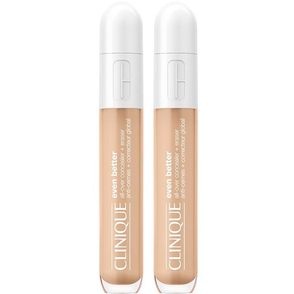 Deux correcteurs Clinique Even Better. Bouchon blanc, correcteur beige. Texte: Even Better, All-over concealer + eraser anti-cernes.