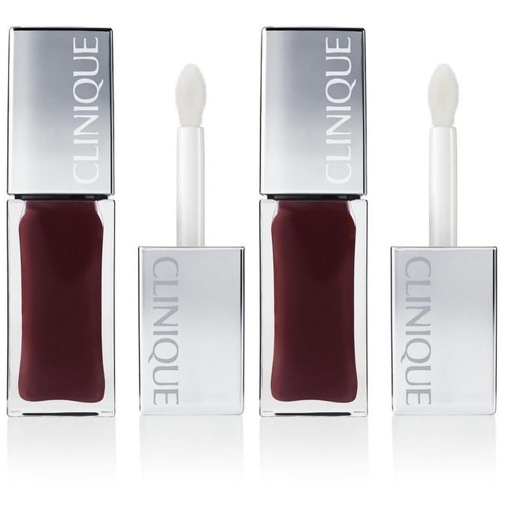 Twee Clinique Pop™ Lip + Cheek Oil flesjes met zilveren dopjes en applicators.