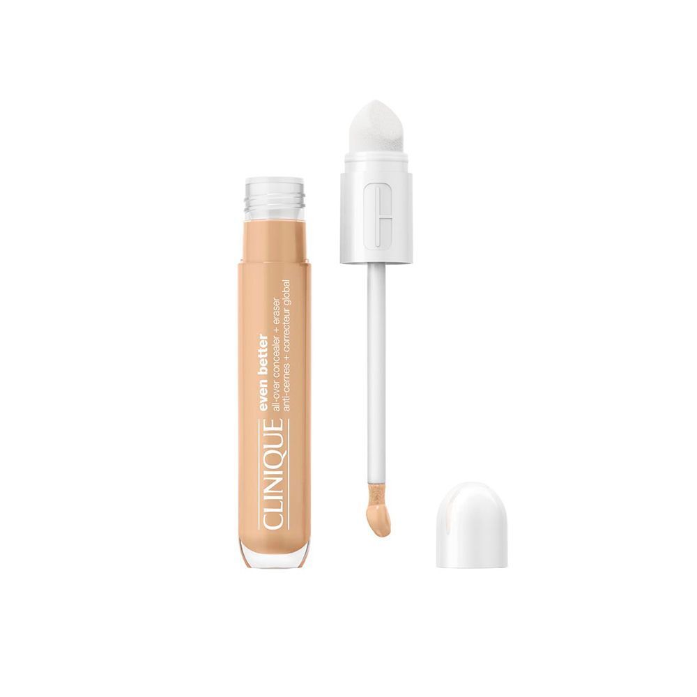 Un correcteur CLINIQUE Even Better™ ouvert, avec applicateur et capuchon séparé.