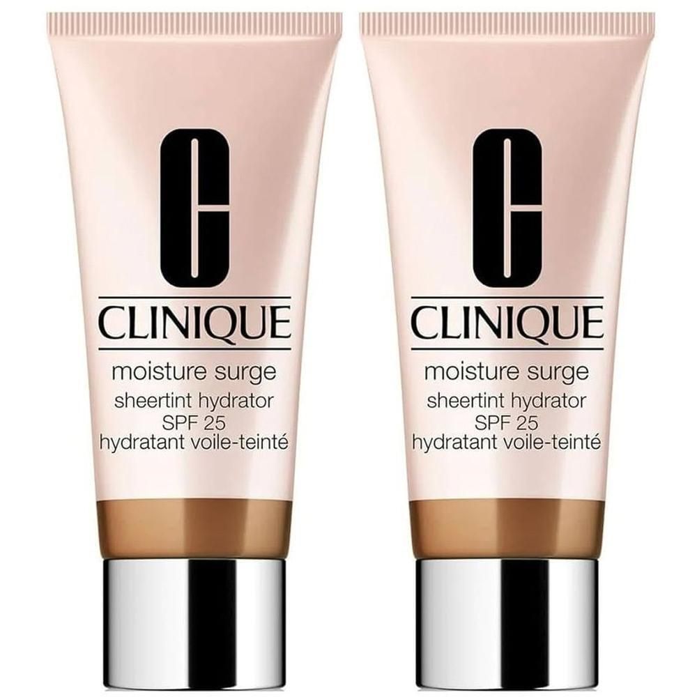 Deux tubes de Clinique Moisture Surge Hydratant Voile-Teinté SPF25. Tubes rose-beige avec bouchons argentés. Logo et texte noirs.