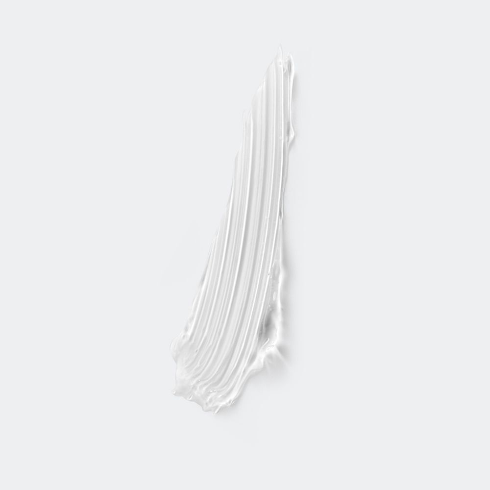Une traînée de gel blanc sur fond gris.