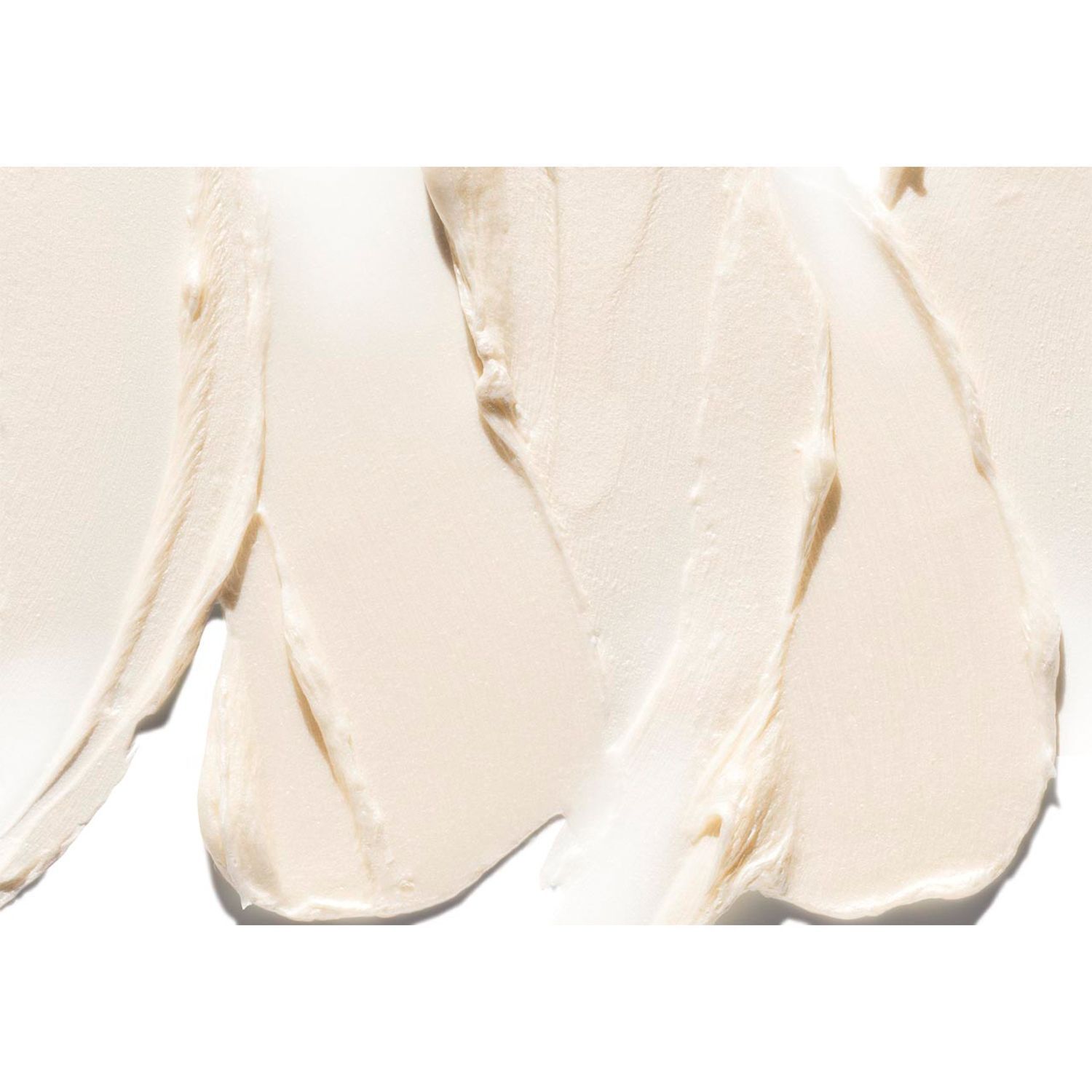 Texture crémeuse de Clinique Deep Comfort Body Wash sur fond blanc.