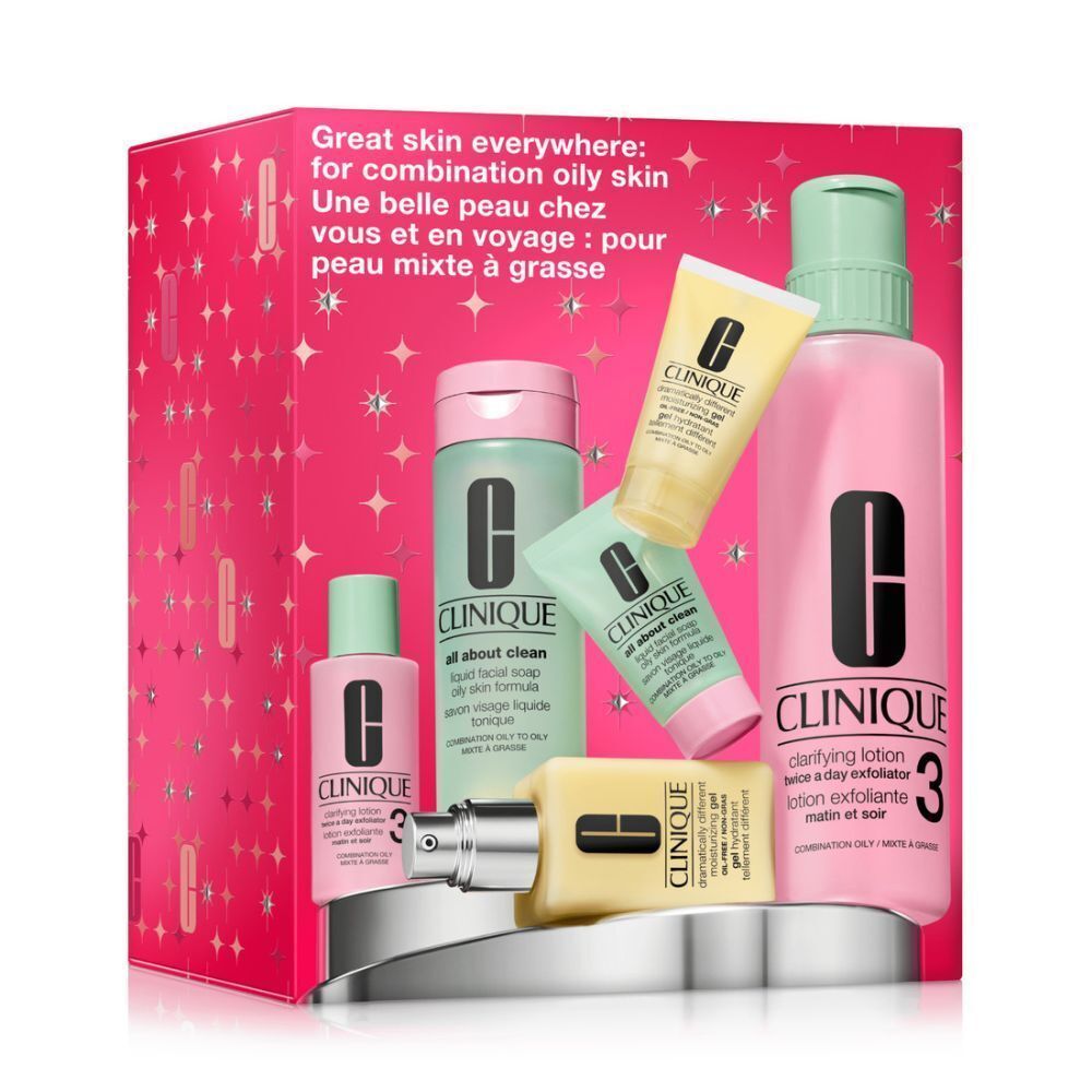 Coffret cadeau Clinique. Produits de soin pour peaux mixtes à grasses. Emballage rose avec motifs étoiles. Flacons divers.