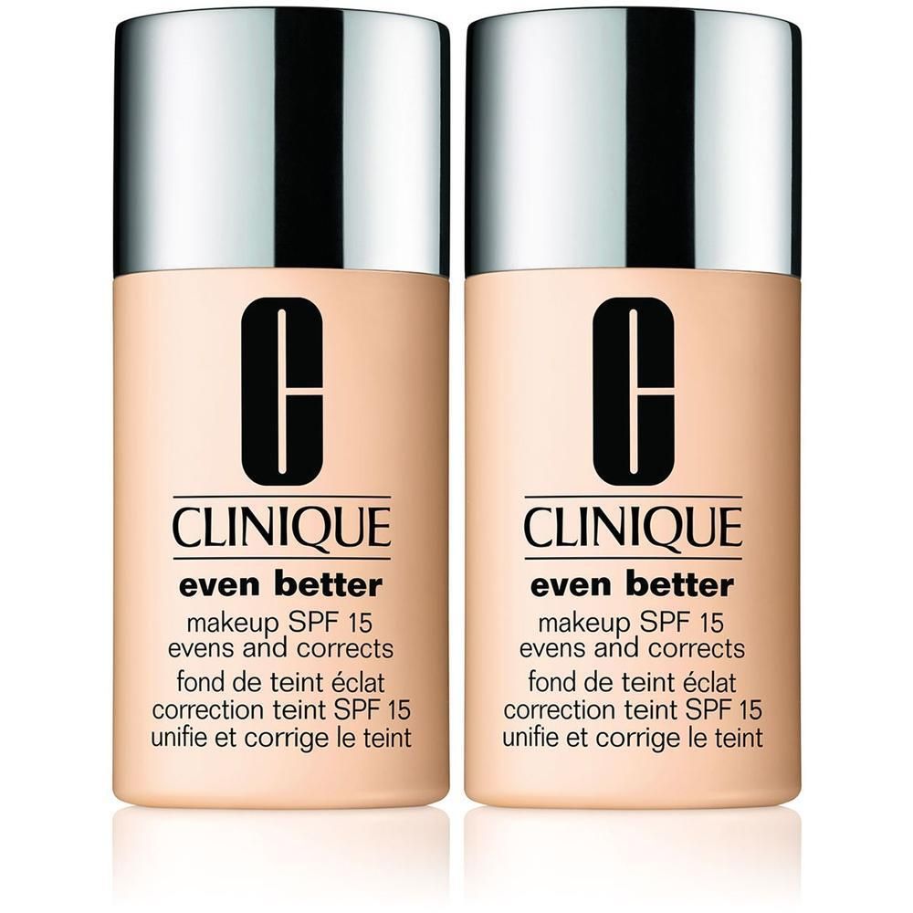 Twee flacons CLINIQUE Even Better makeup SPF 15. Beige tint. Cilindrische vorm met zilveren dop. Zwart logo en tekst.