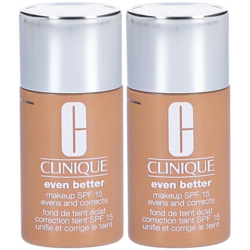 Twee flacons CLINIQUE Even Better foundation. Beige-bruine kleur, zilveren dop. Opschrift: Even Better, SPF 15, unifie et corrige le teint.
