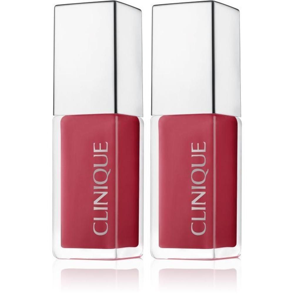 Deux flacons de liquide rouge avec bouchons argentés. Le mot « CLINIQUE » est visible.