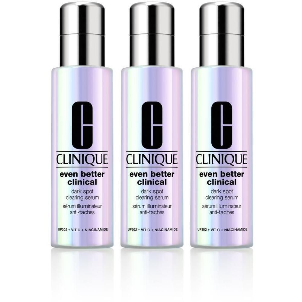 Trois flacons Even Better Clinical™ Sérum, bouchons argentés et étiquettes. Inscription : CLINIQUE, sérum illuminateur anti-taches.