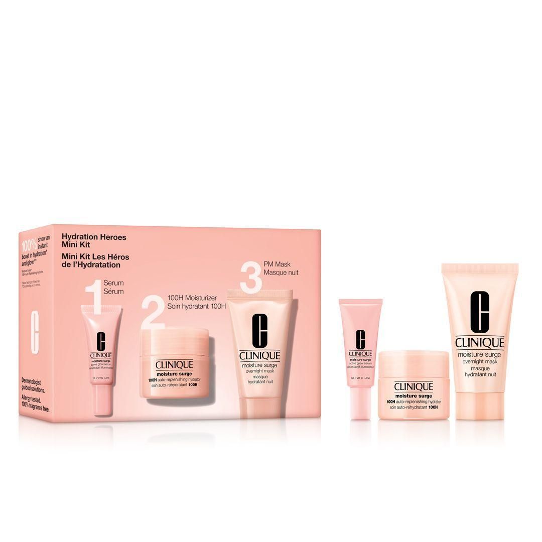 Coffret cadeau Clinique. Contient sérum, hydratant 100H et masque de nuit. Emballage rose avec logo Clinique.