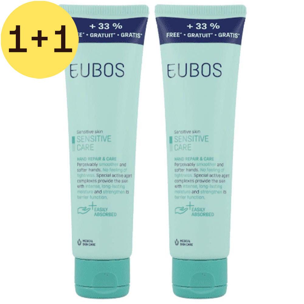 Twee tubes EUBOS Repair & Care Crème Mains. Lichtgroene tubes met blauwe tekst. Opschrift: Sensitive Care, +33% gratis.