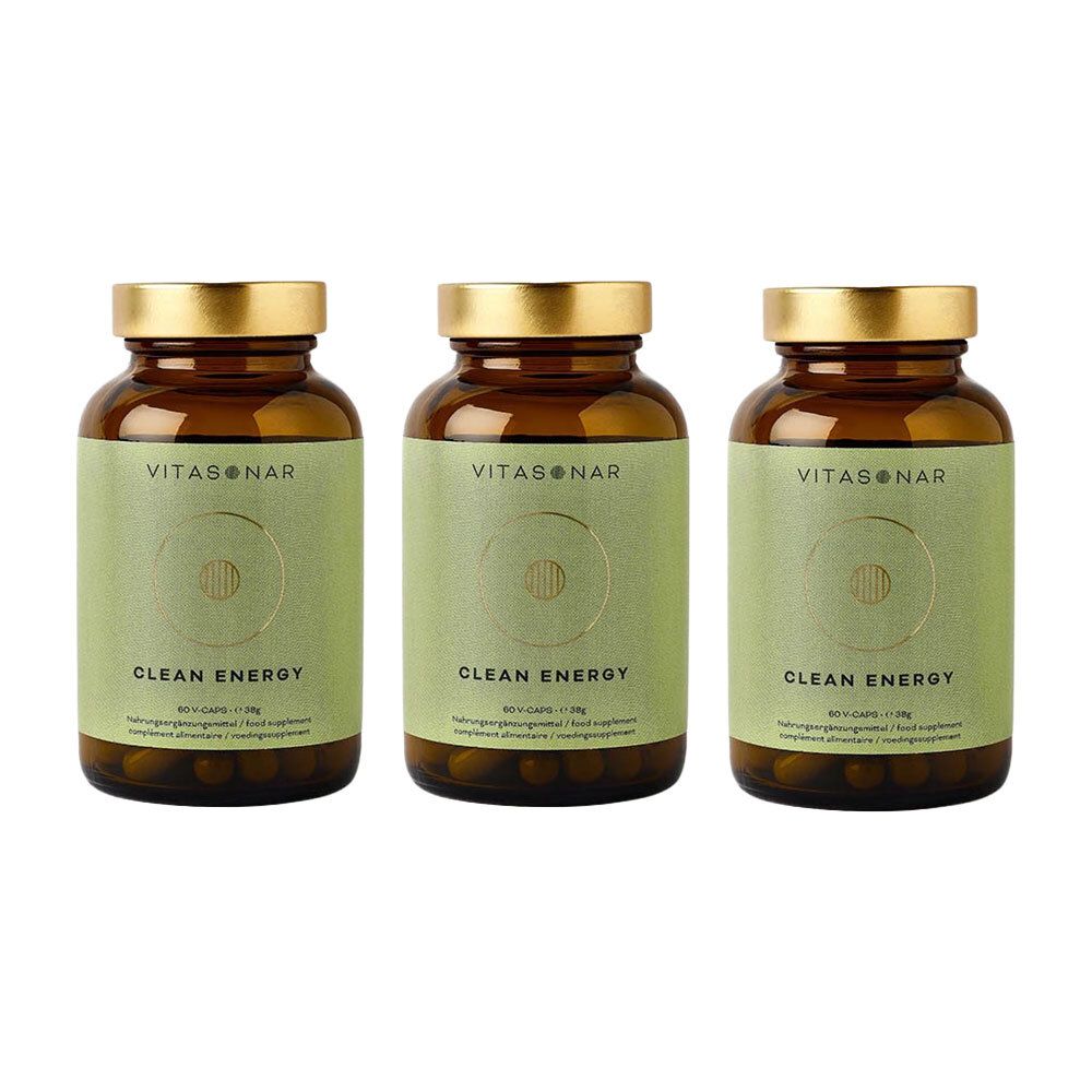 Drie bruine glazen flessen met gouden doppen. De etiketten tonen "VITASONAR" en "CLEAN ENERGY".