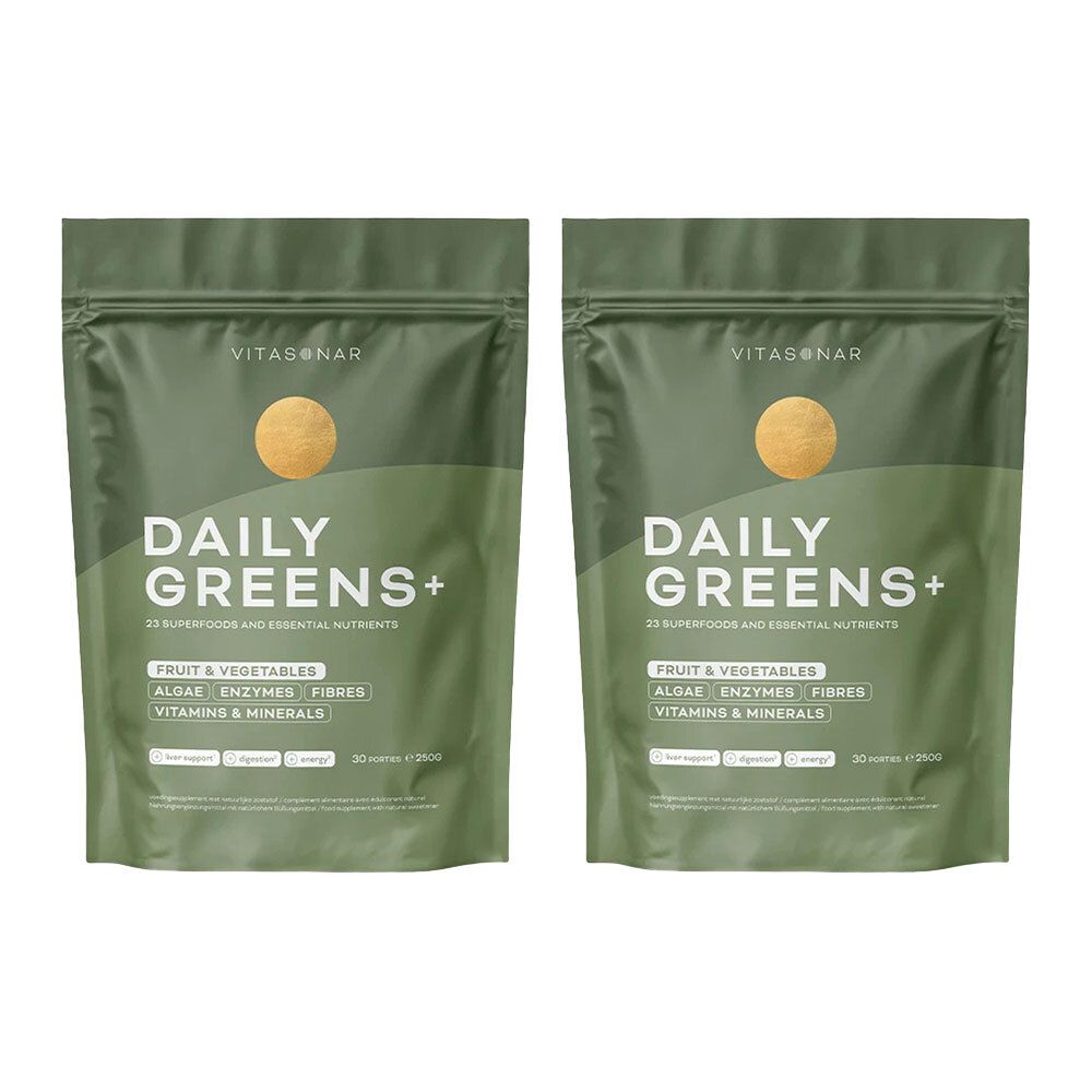 Twee groene zakjes met de tekst "DAILY GREENS+". Opschrift: fruit & groenten, algen, enzymen, vezels, vitaminen & mineralen.
