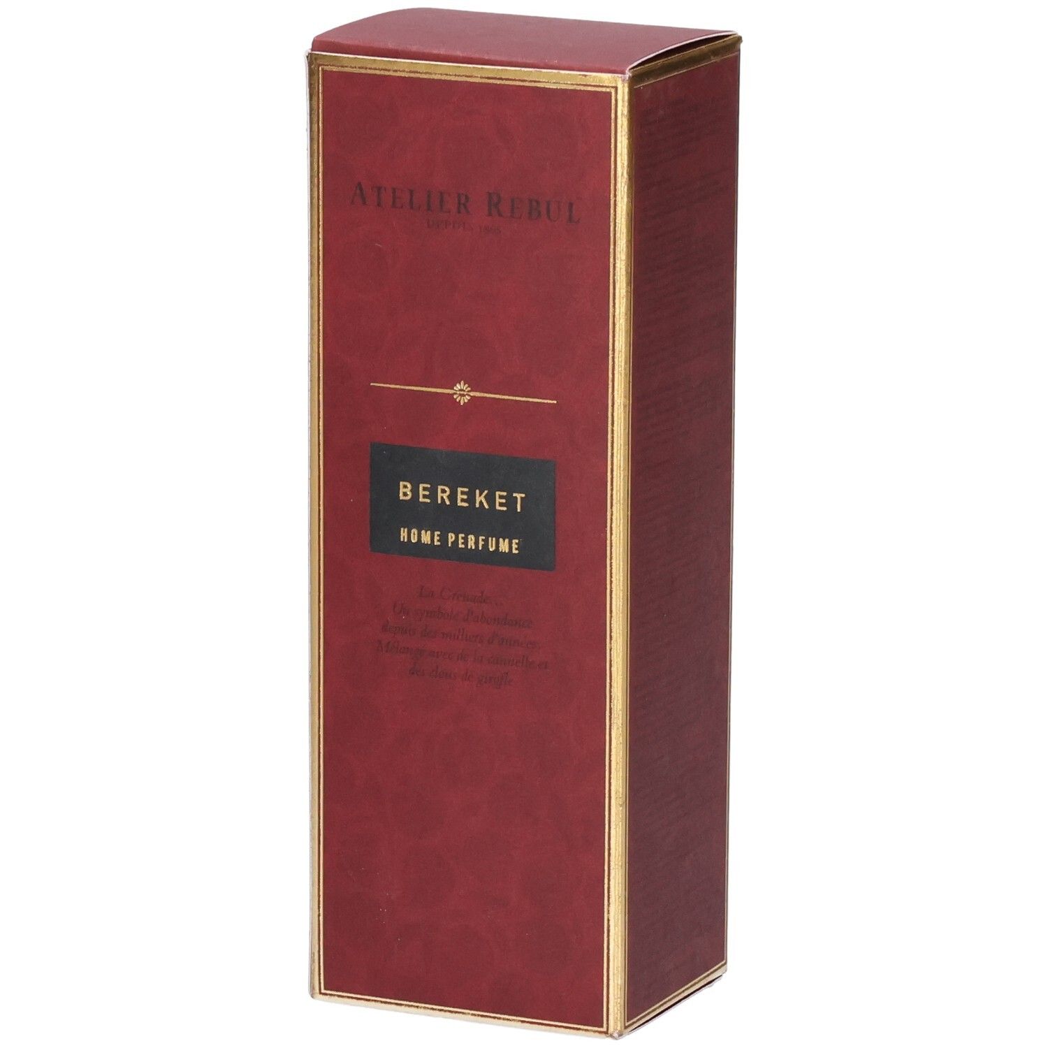 Boîte rouge avec bordure dorée, inscription "Atelier Rebul Bereket Home Perfume".