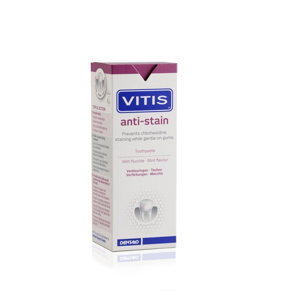 Boîte de dentifrice Vitis Anti-Stain. Blanc avec texte bleu et rose. Contient des informations sur le produit.
