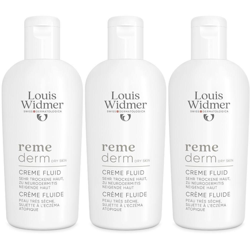 Drie flacons Louis Widmer Remederm Crème fluide. Witte flacons met witte doppen. Productnaam en logo zichtbaar.