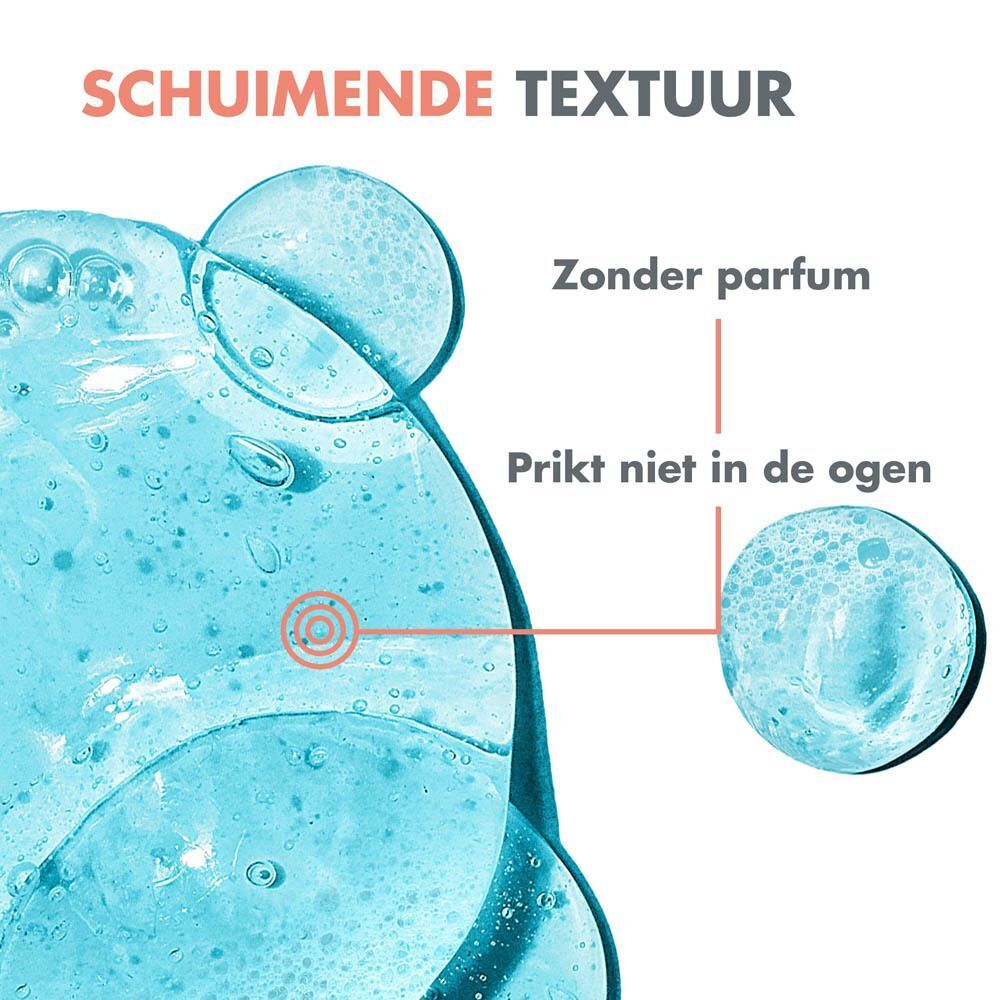 Close-up van blauwe gel met schuimbellen. Tekst: Schuimende textuur, zonder parfum, prikt niet in de ogen.