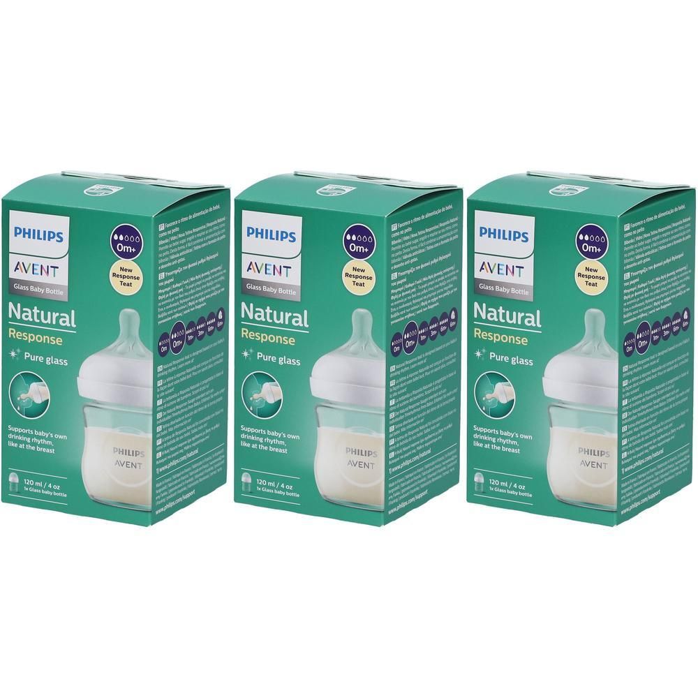 Drie groene dozen met babyflessen. Op de dozen staat "PHILIPS AVENT Natural Response". De flessen zijn van glas.