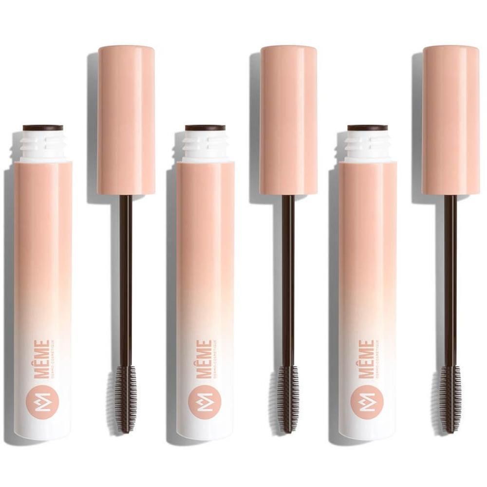 Cinq tubes de mascara ouverts. Dégradé blanc/rose. Brosses noires. Marque Même.