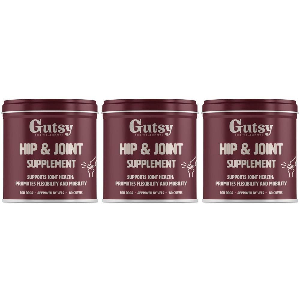 Drie blikken Gutsy Hip & Joint Supplement. Opschrift: Ondersteunt de gezondheid van de gewrichten, bevordert flexibiliteit en mobiliteit.