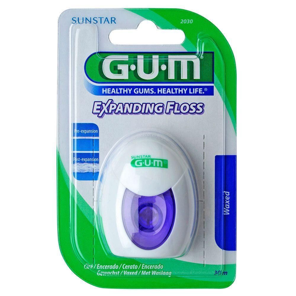 Emballage GUM Expanding Floss. Boîtier blanc avec cœur violet. Inscription: Waxed, 30 m.