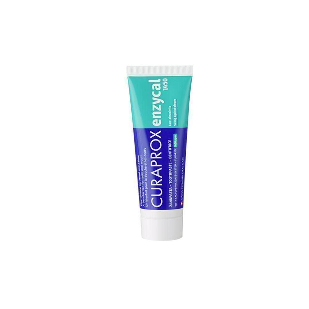 Tube de dentifrice bleu et turquoise. Logo CURAPROX et nom du produit enzycal 1450 visibles.