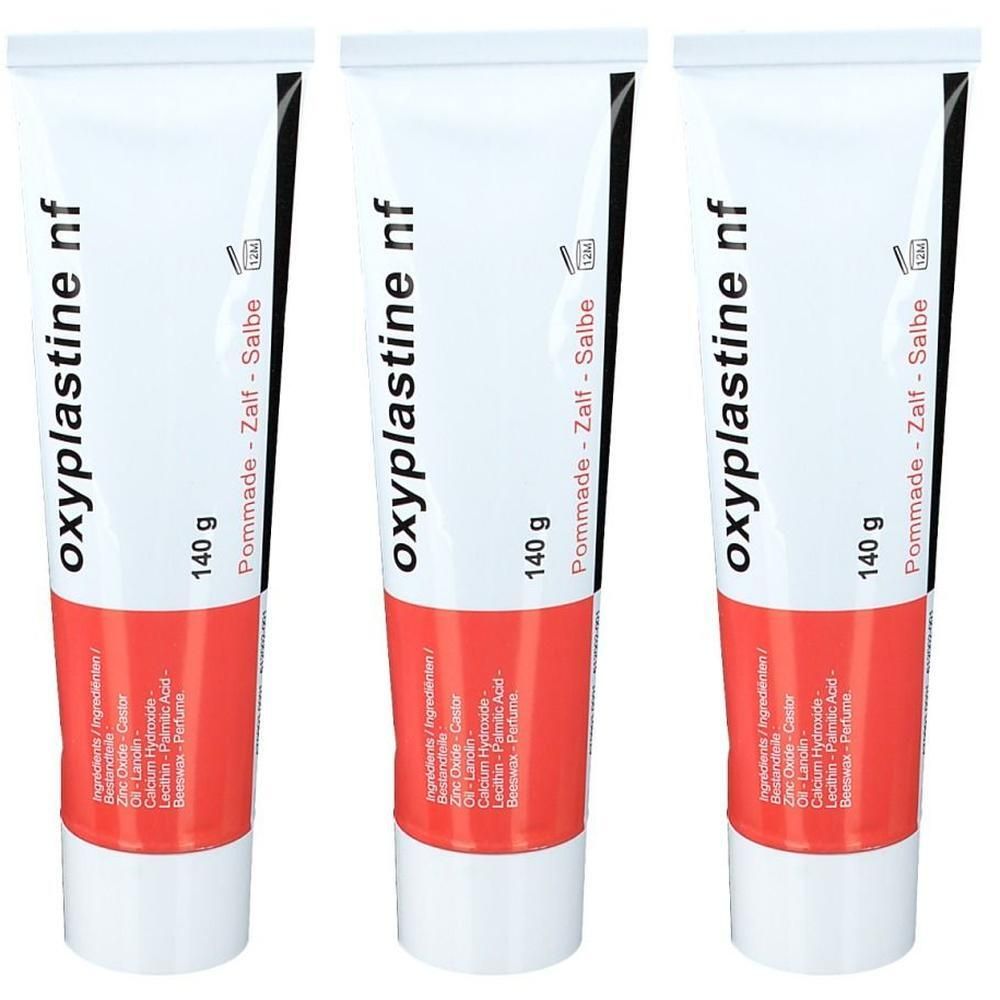 Drie tubes Oxyplastine nf, 140 g, Pommade-Zalf-Salbe. Wit, rood en zwart design. Productnaam en ingrediënten gedrukt.