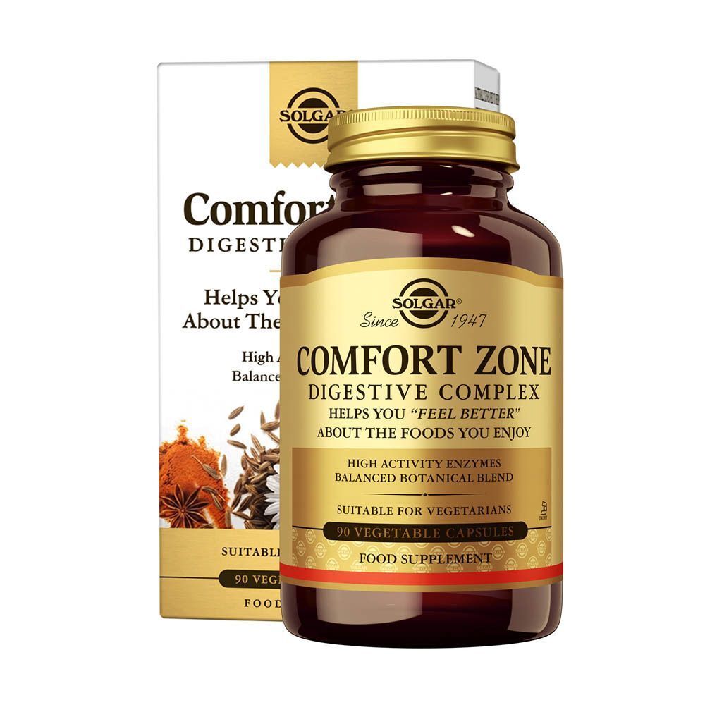 Bruine glazen fles met gouden dop en etiket, naast een witte doos. Opschrift: Comfort Zone Digestive Complex, Solgar.