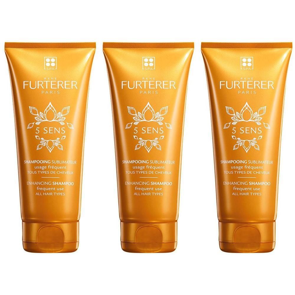 Trois tubes de shampooing dorés. Inscriptions blanches: FURTERER PARIS, 5 SENS, Shampooing Sublimateur, tous types de cheveux. Forme tubulaire.