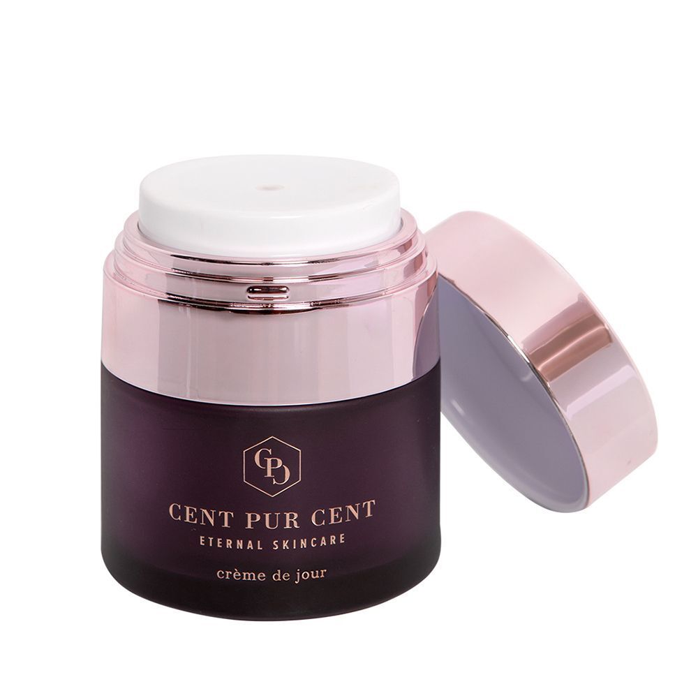 Pot de Cent Pur Cent Eternal Crème de jour. Verre violet foncé, couvercle or rose. Couvercle ouvert.