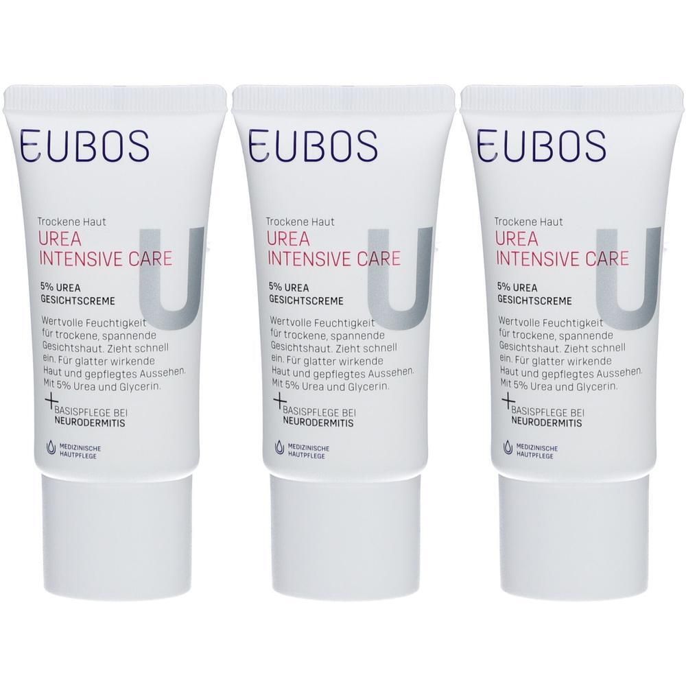 Trois tubes de crème visage Eubos Urea 5%. Tubes blancs avec texte bleu et gris. Inscription : Urea Intensive Care.