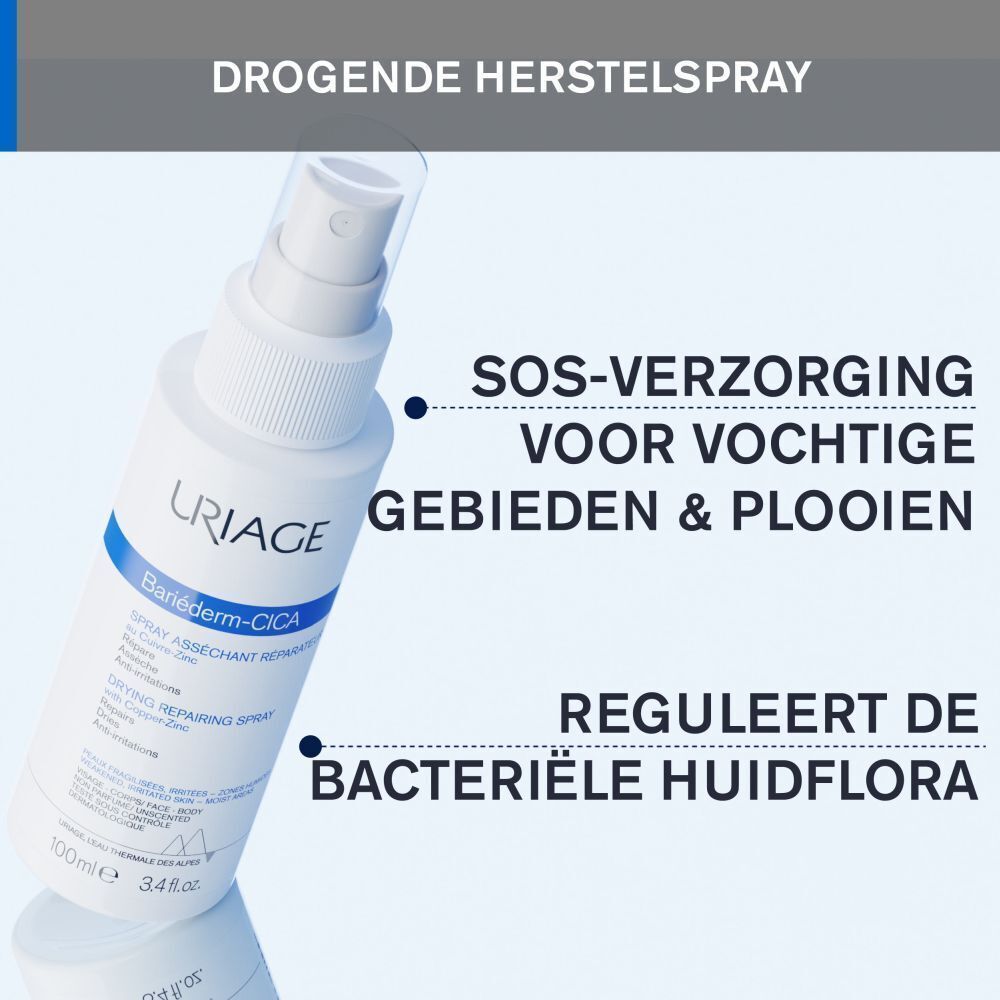 Witte spuitfles met blauw etiket. Tekst: Drogende Herstel Spray, SOS-verzorging, Reguleert de bacteriële huidflora.