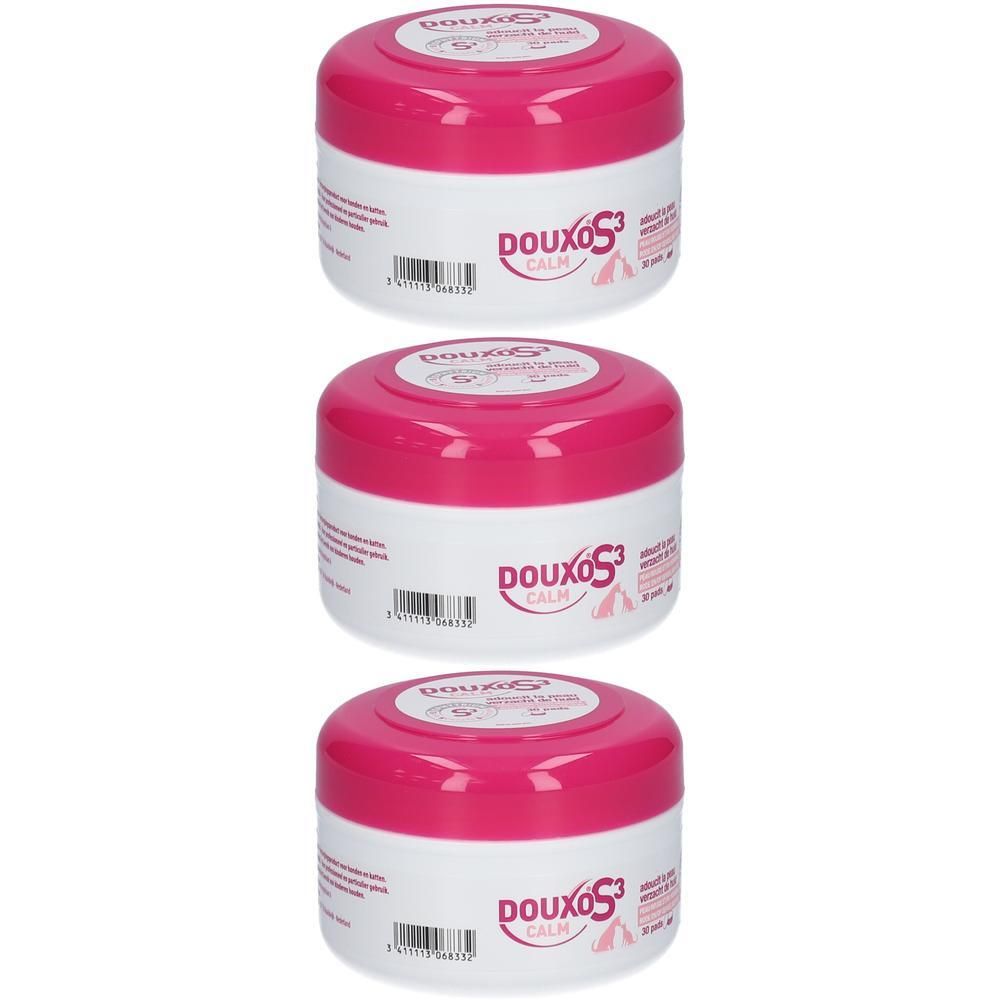 Trois pots ronds, couvercles roses, corps blancs. Inscription Douxo S3 Calm.