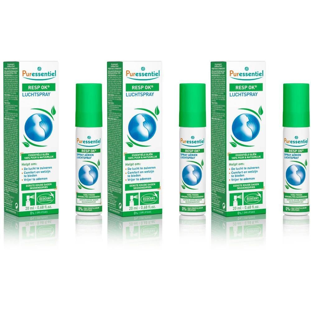Meerdere flessen en verpakkingen. Groen-witte verpakking met logo en productnaam. Groene spuitflessen.