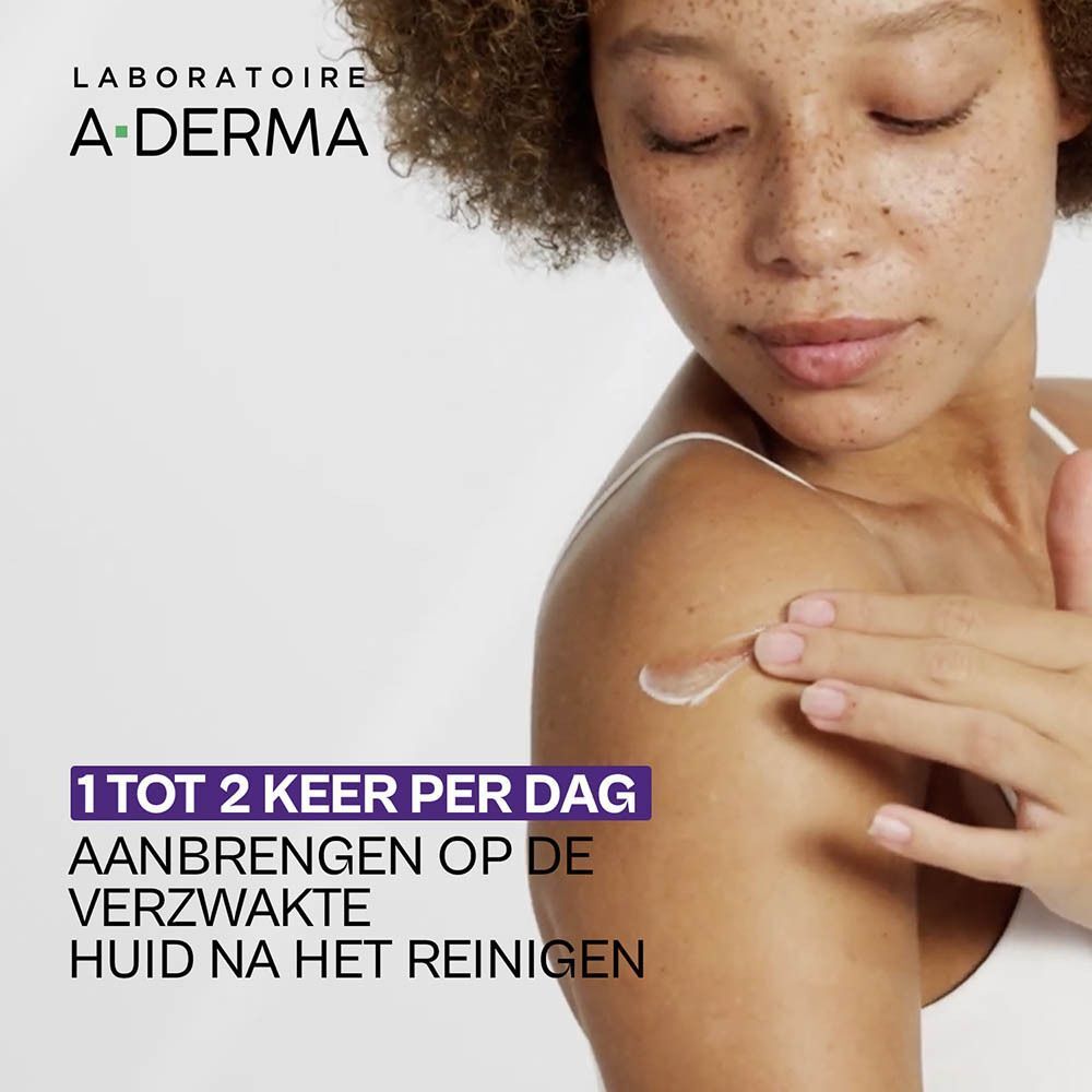 Vrouw brengt crème aan op de huid. Tekst: 1 tot 2 keer per dag aanbrengen op de aangedane zone.