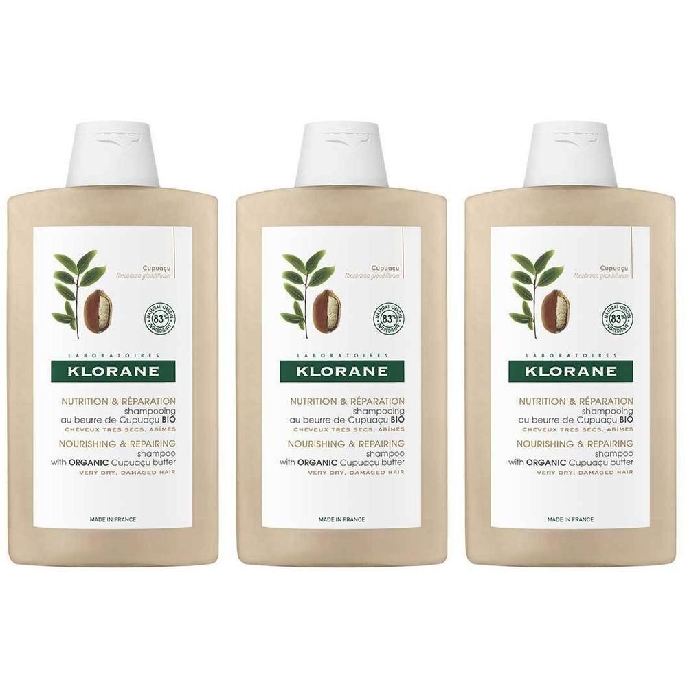 Trois flacons de shampooing. Flacons beiges avec bouchon blanc. Inscription : Klorane, Nutrition & Réparation, Shampooing au beurre de Cupuaçu BIO.