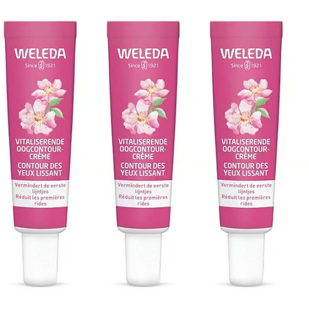Drie roze tubes oogcrème. Bloemenontwerp en tekst. Opschrift: WELEDA, Vitaliserende Oogcontour-Crème, Contour des Yeux Lissant.