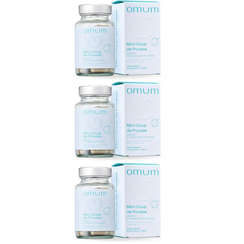 Drie flessen en dozen Omum Mon Coup de Pousse. Capsules in glazen flessen.