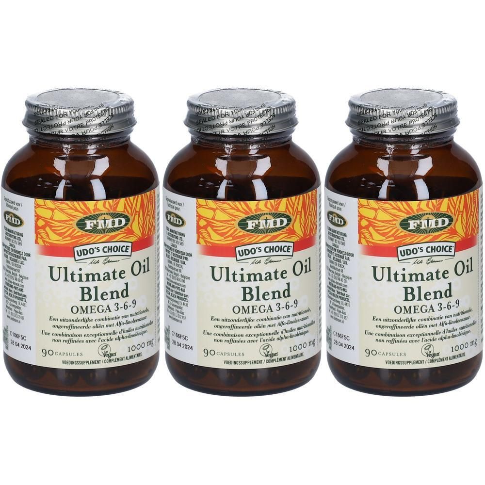 Trois flacons en verre brun avec des couvercles argentés. Les étiquettes indiquent "Udo's Choice Ultimate Oil Blend Omega 3-6-9".