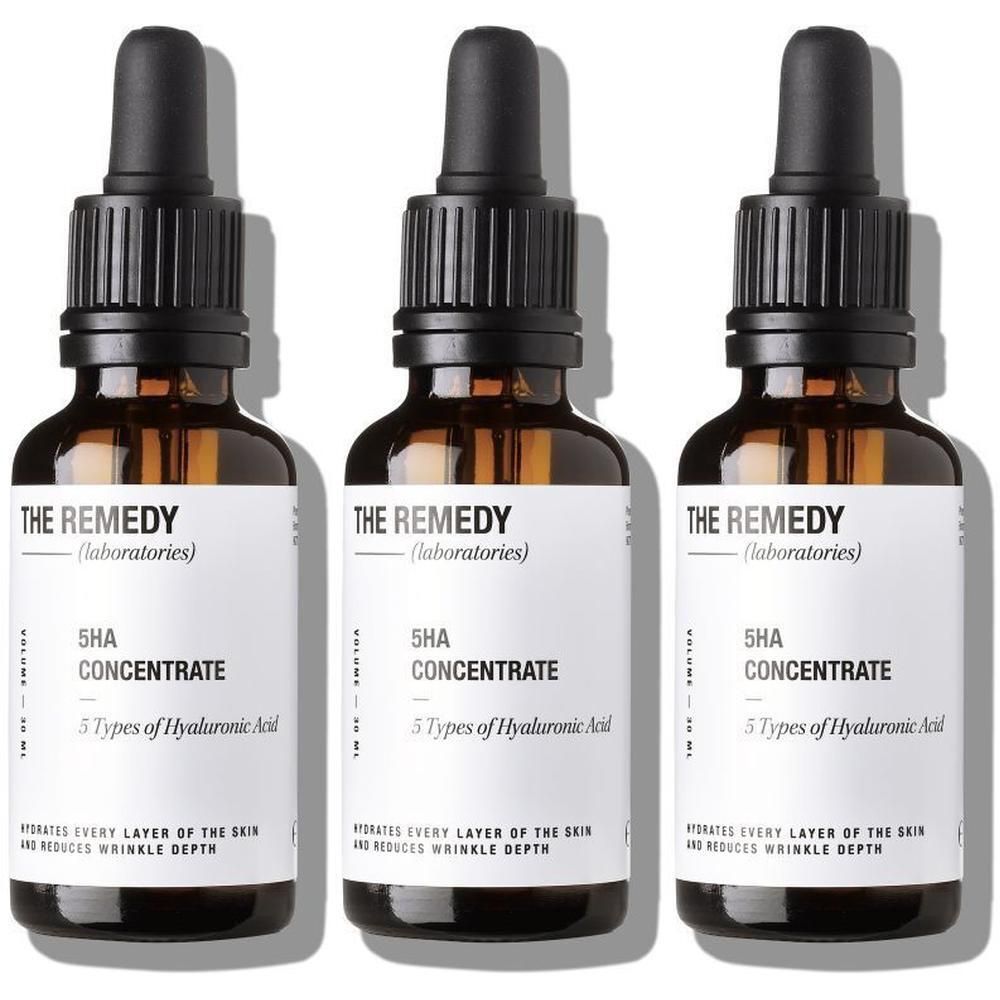 Trois flacons en verre brun avec des bouchons noirs. Les étiquettes indiquent "THE REMEDY (laboratories) 5HA CONCENTRATE".