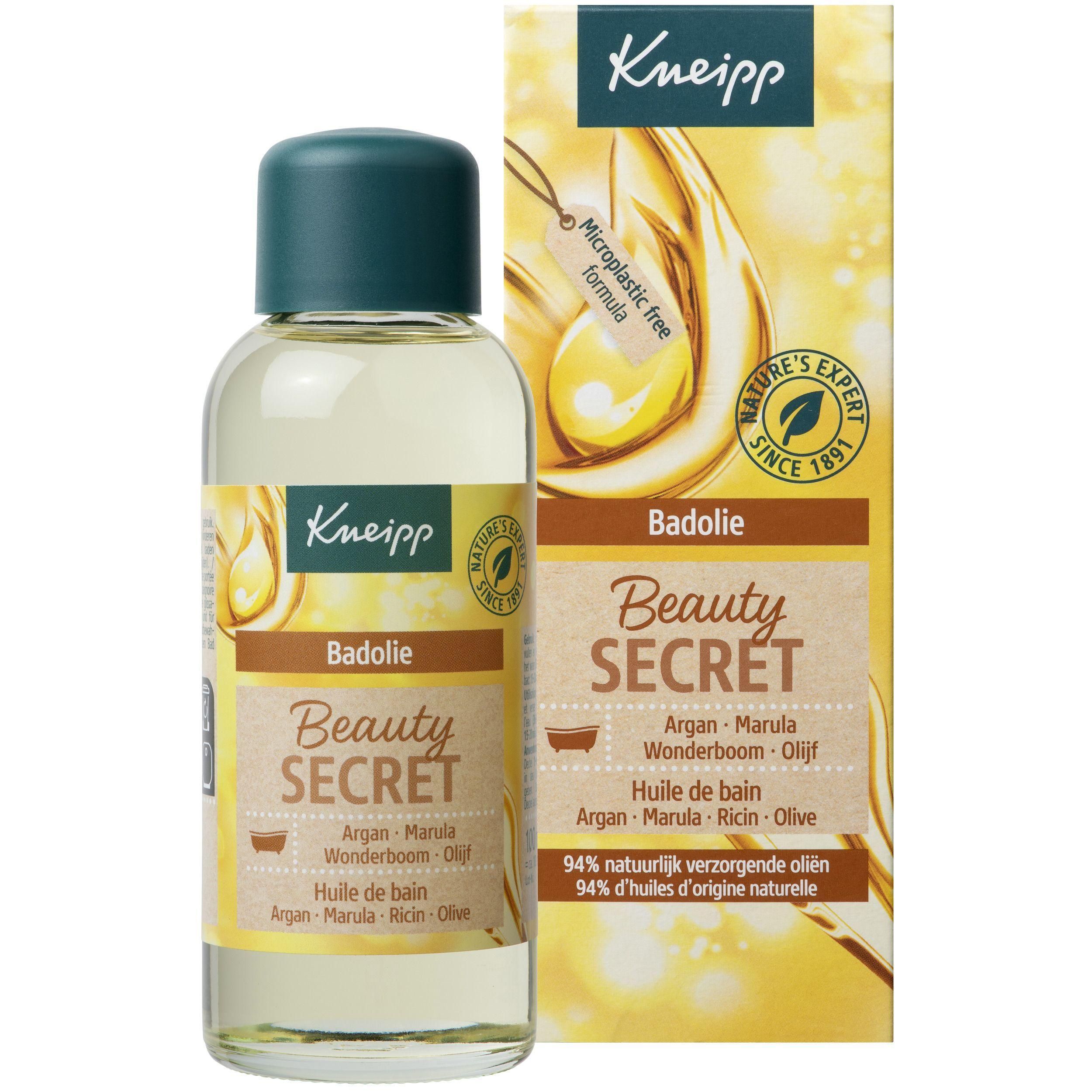 Flacon et emballage Kneipp Badolie Beauty Secret. Bouchon vert, liquide jaune. Texte : Badolie, Beauty Secret, Argan, Marula, Wonderboom, Olif.