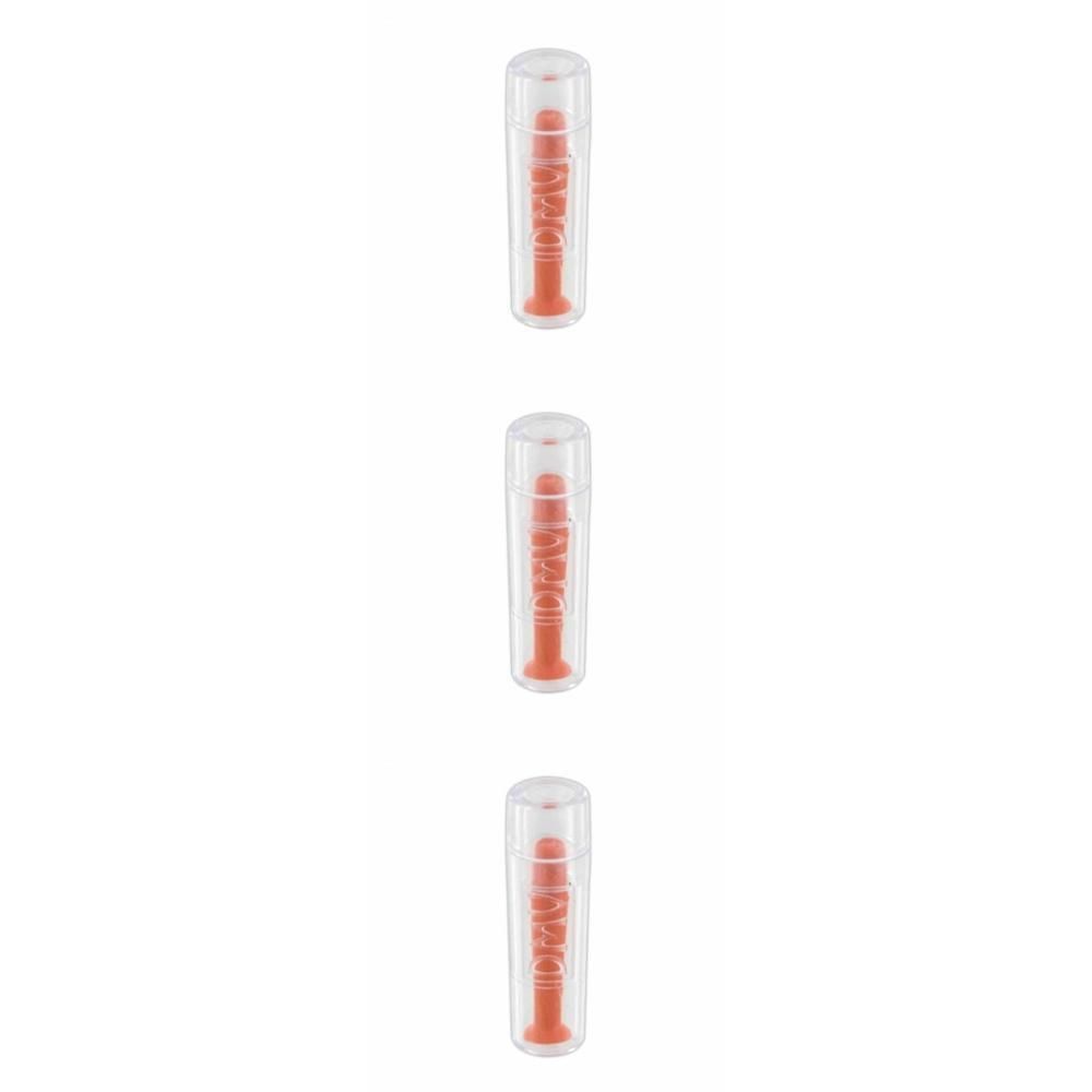 Trois ventouses orange pour lentilles de contact, dans des étuis transparents. Chaque ventouse a une tige cylindrique.
