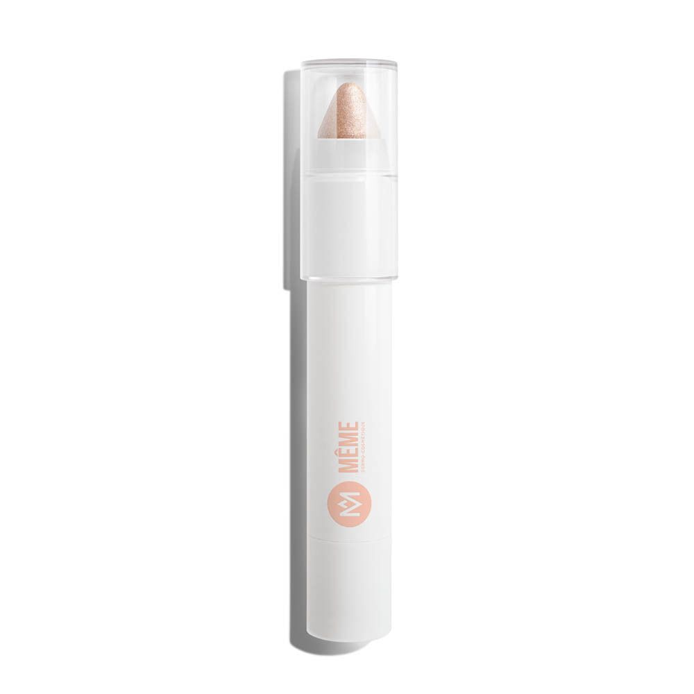 Witte stift met gouden oogschaduw, dop verwijderd. Logo "Même".