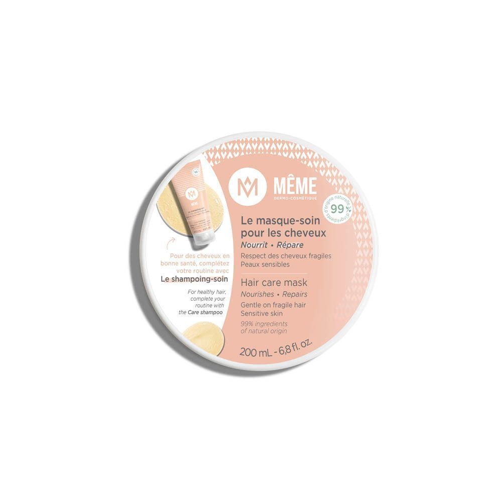 Pot rond MÊME Le masque-soin pour les cheveux. Étiquette rose, couvercle blanc. Texte: Nourrit, répare, peaux sensibles.