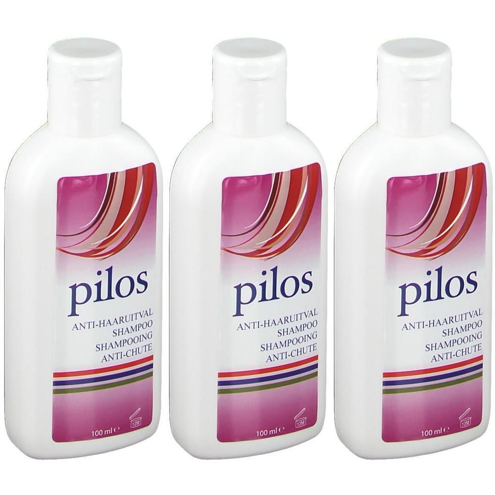 Drie witte flessen Pilos Anti-Haaruitval Shampoo. Elke fles heeft een etiket met productinformatie en een roze design.